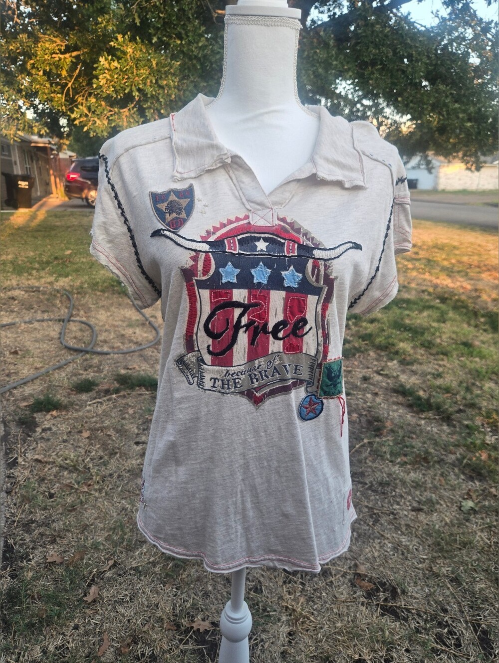 Double D Ranch Cream Polo with Red & Blue Graphic